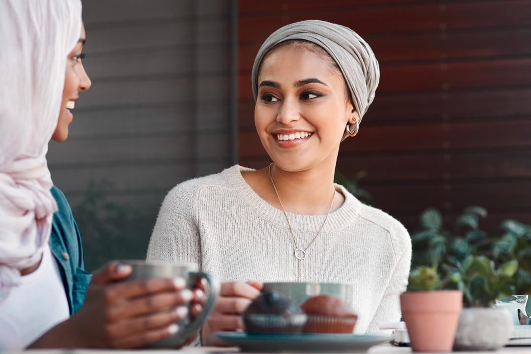 two women enjoying coffee