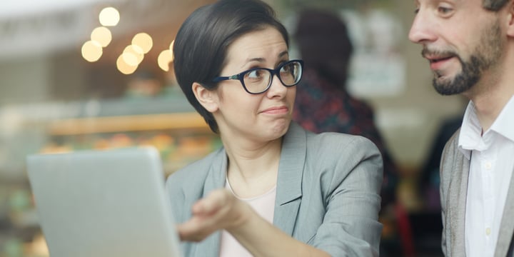 A woman speaking with a client to determine if he is an ideal client