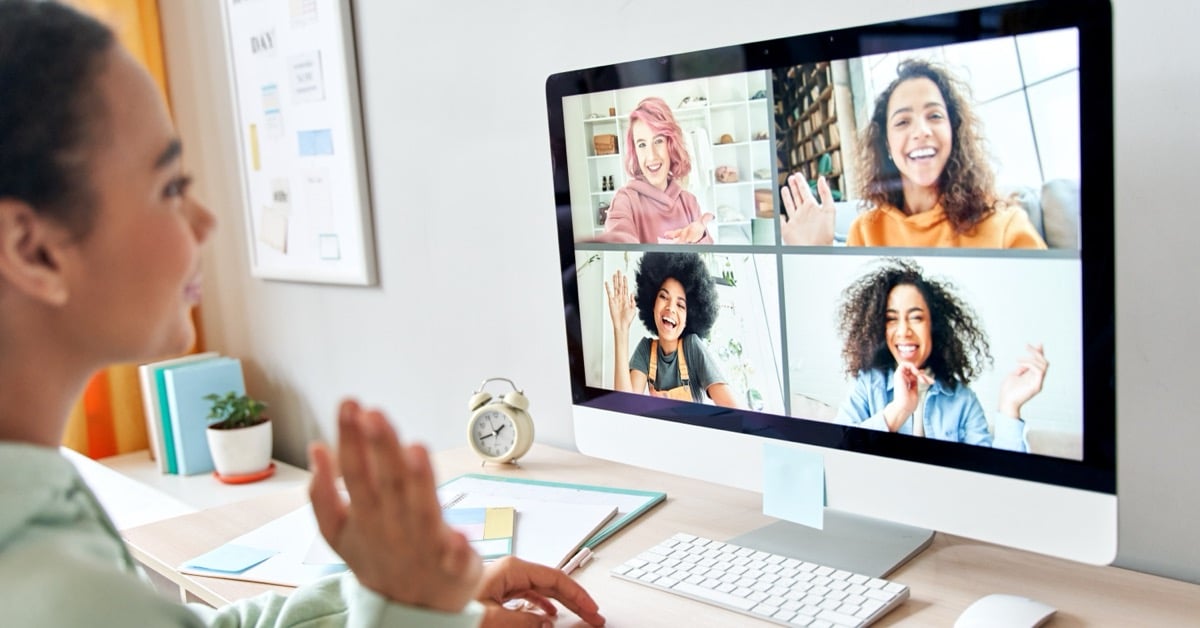 Travel advisor on a video call with several colleagues