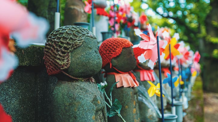 Japanese Buddhist Jizo Statues In A Temple In Tokyo, Japan