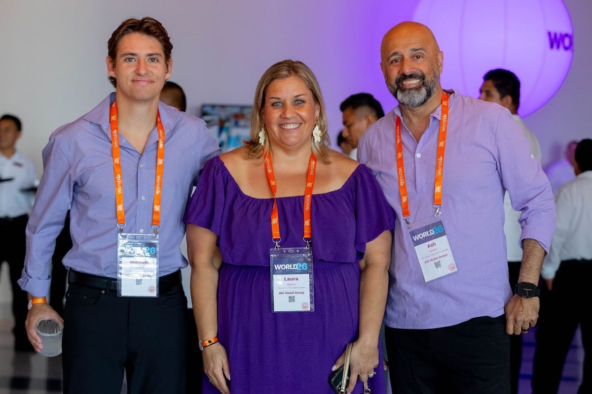 Travel advisors smiling together at WORLD26