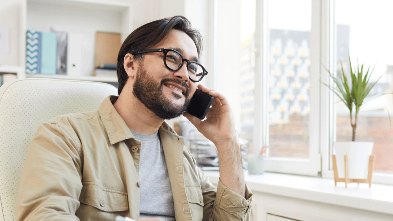 man on phone talking to customer