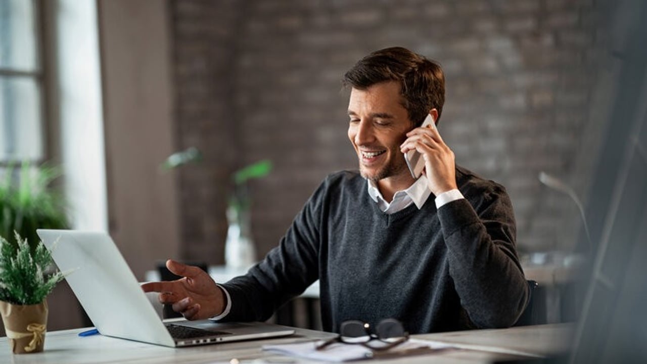 man on phone talking to customer