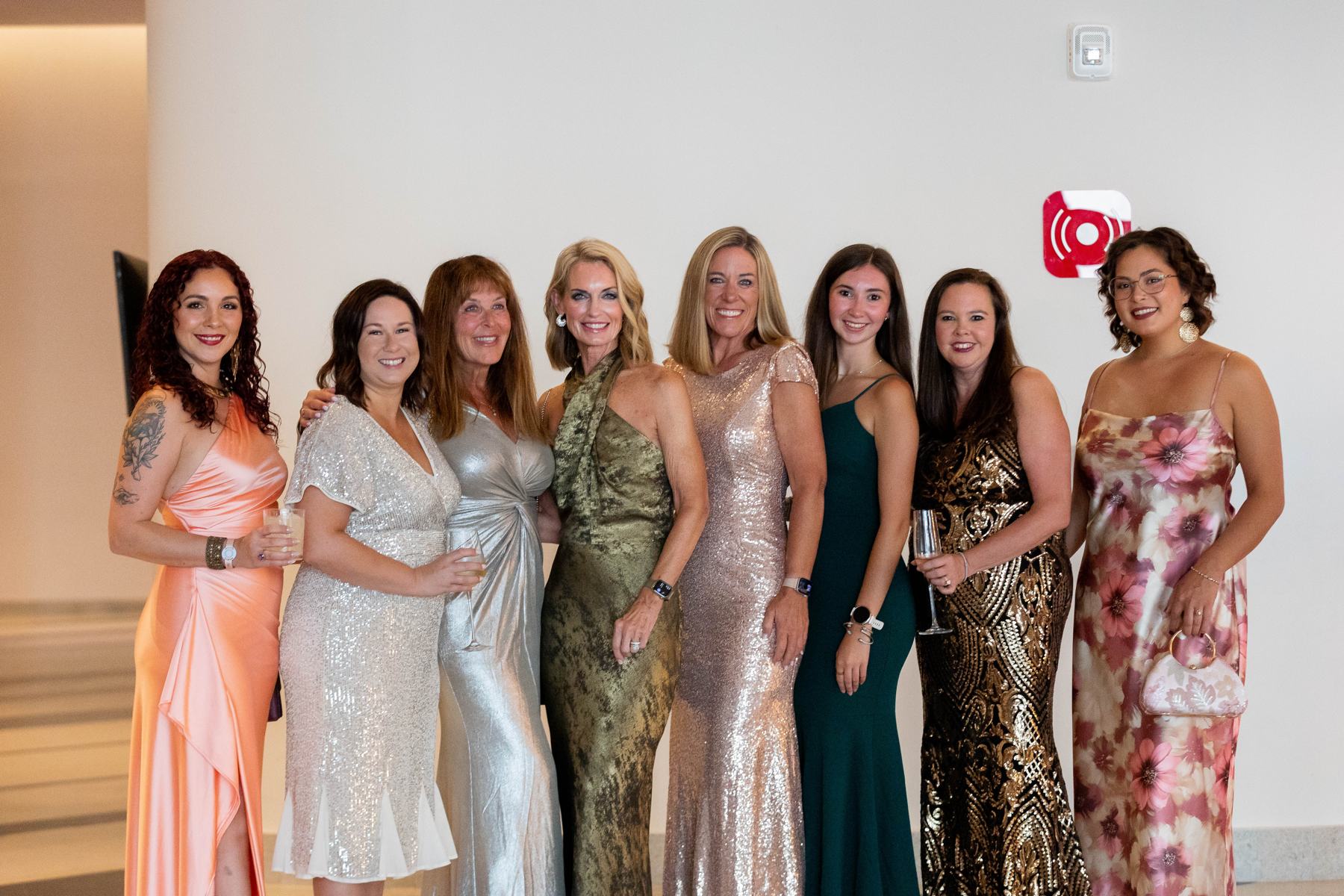 A group of members in evening wear at the WORLD26 Questys